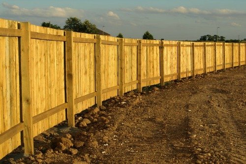 Wood fence with a fresh coat of stain